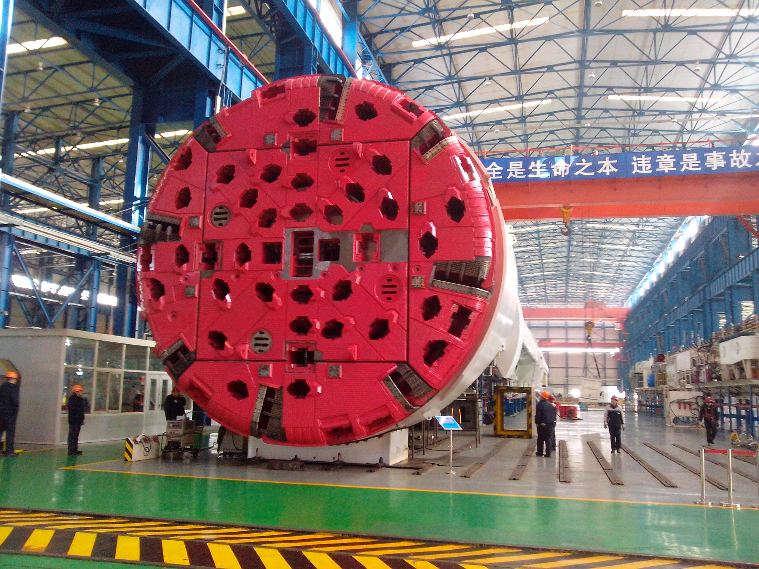 Open-face rock drilling machine